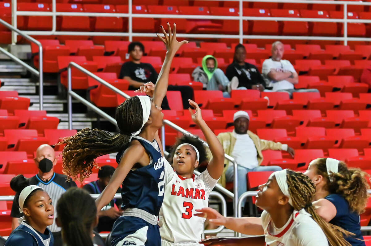 Lamar guard Sabria Dean gets a shot off over the Longwood defender Saturday afternoon at the Montagne Center.