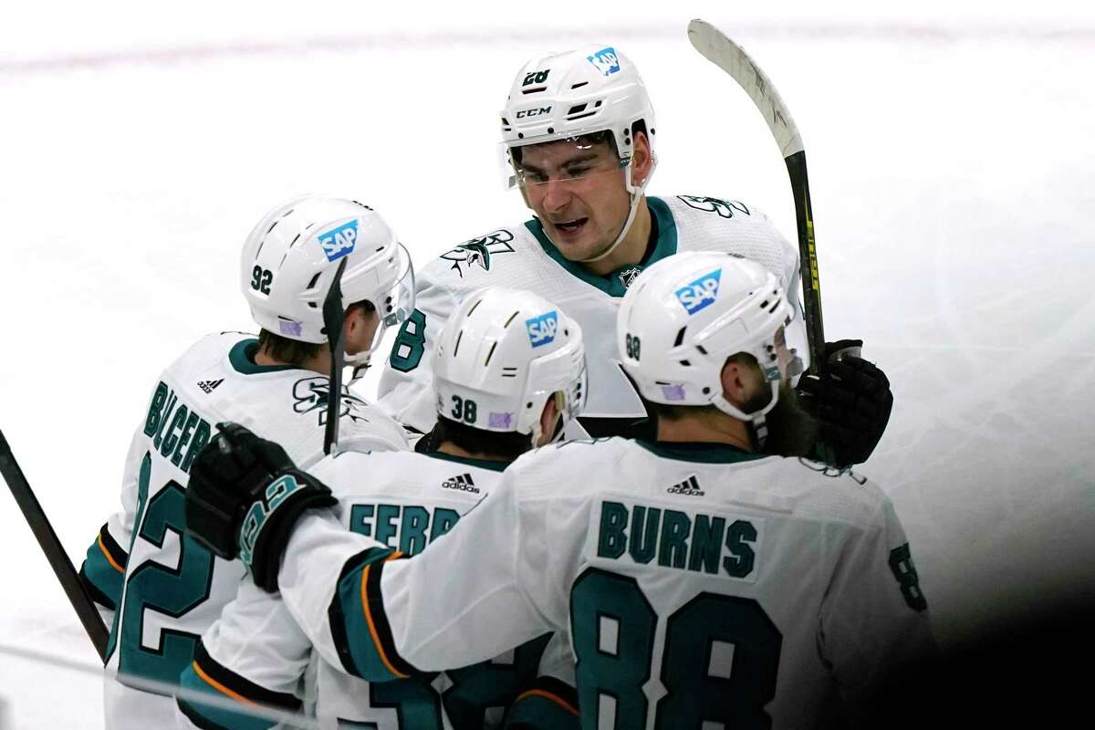 San Jose Sharks right wing Timo Meier (28) celebrates with teammates after scoring a goal against the Chicago Blackhawks during the second period of an NHL hockey game in Chicago, Sunday, Nov. 28, 2021. (AP Photo/Nam Y. Huh)