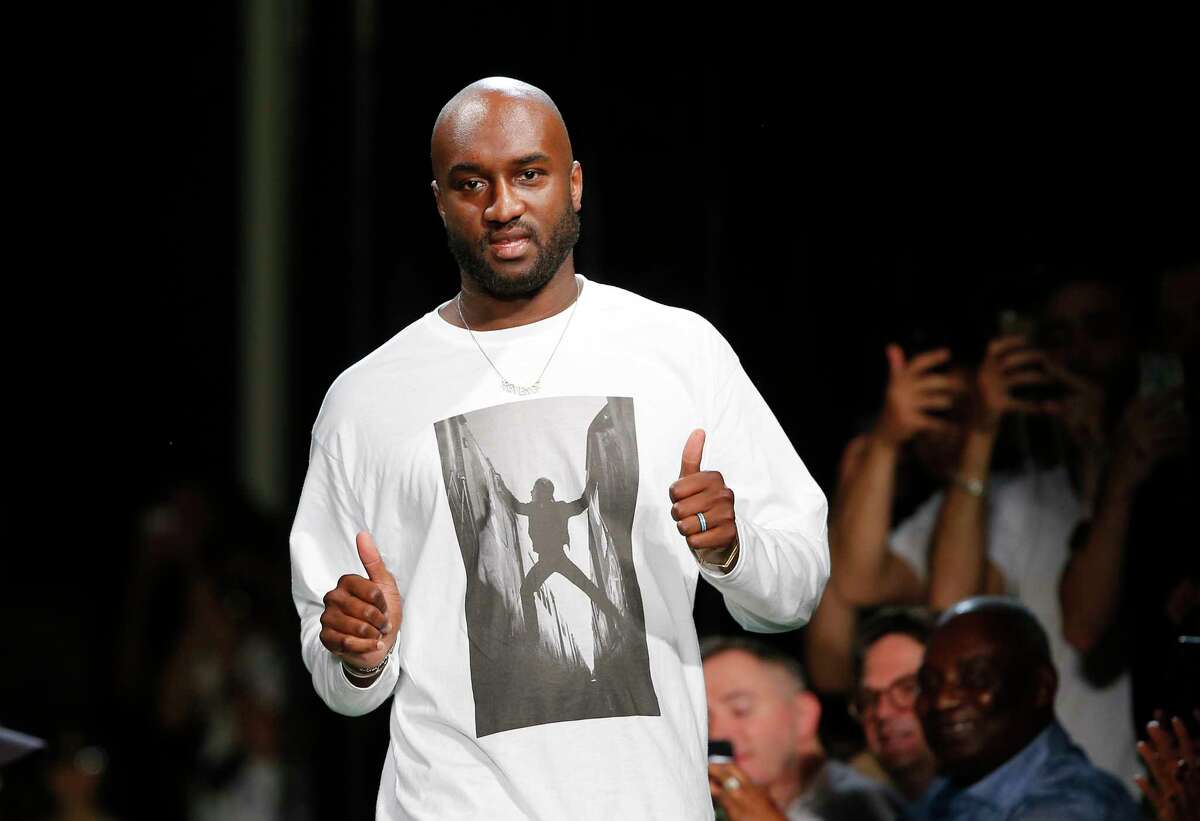 Fashion designer Virgil Abloh gives a thumbs up after the presentation of Off-White Men's Spring-Summer 2019 collection. He died at age 41 from cancer on Sunday. 