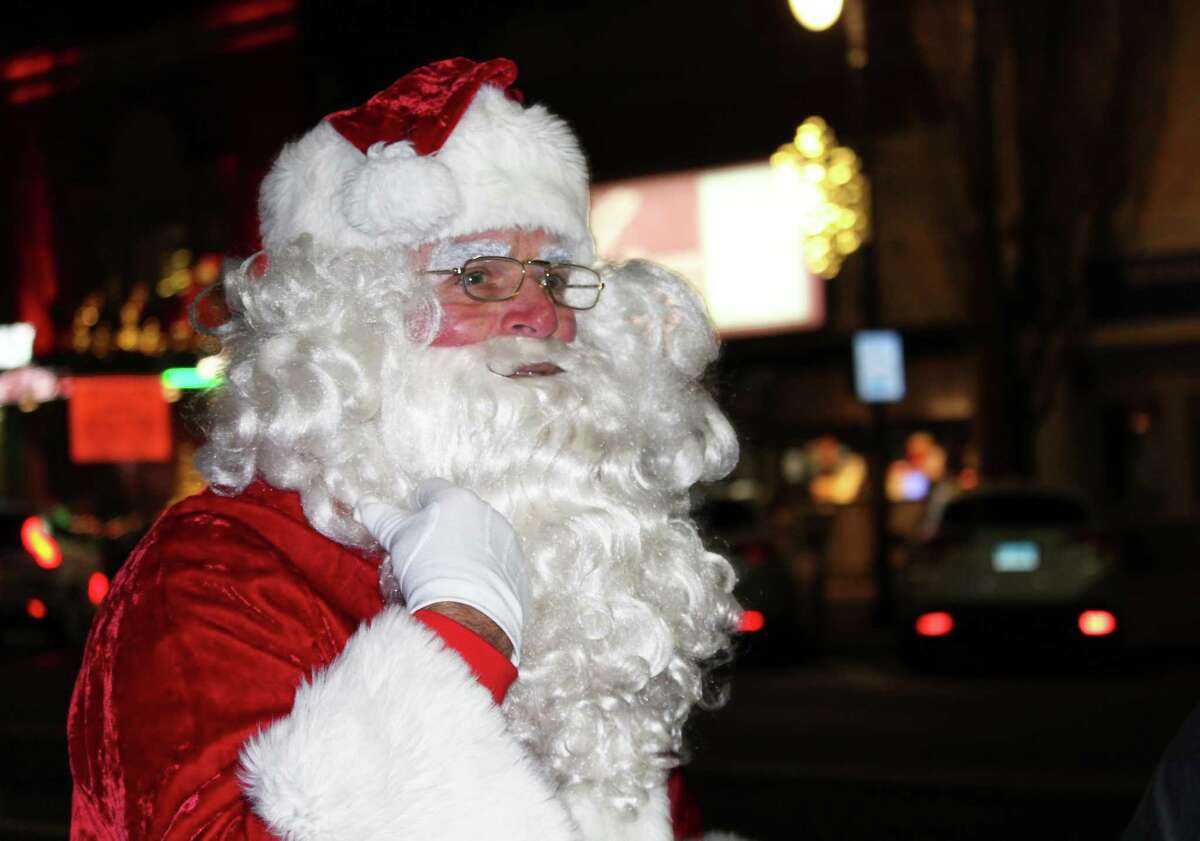 The city's Holiday on Main activities kicked off with antique tractor-drawn cart rides, a carol sing, parade to the South Green led by the Middletown High School band and Santa, followed by three tree lightings.