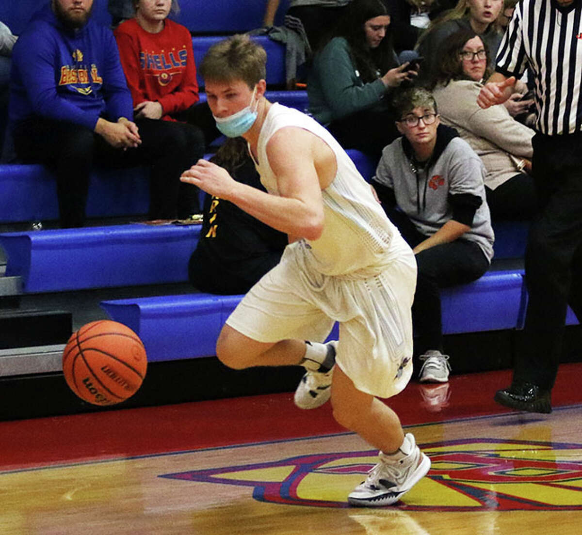 Jersey's Edward Roberts, along with teammate Ayden Kanallakan, each scored 11 points Monday in the Panthers' win over Woodlawn in the Duster Thomas Hoops Classic. Above, Roberts heads upcourt against the host Shells in the Hoopsgiving Classic at Roxana.