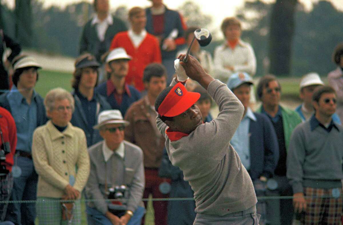 FILE - Lee Elder participates in the Masters Tournament at Augusta, Ga., May 9, 1975. Elder broke down racial barriers as the first Black golfer to play in the Masters and paved the way for Tiger Woods and others to follow. The PGA Tour confirmed Elder’s death, which was first reported by Debert Cook of African American Golfers Digest. No cause or details were immediately available, but the tour said it spoke with Elder's family. He was 87.