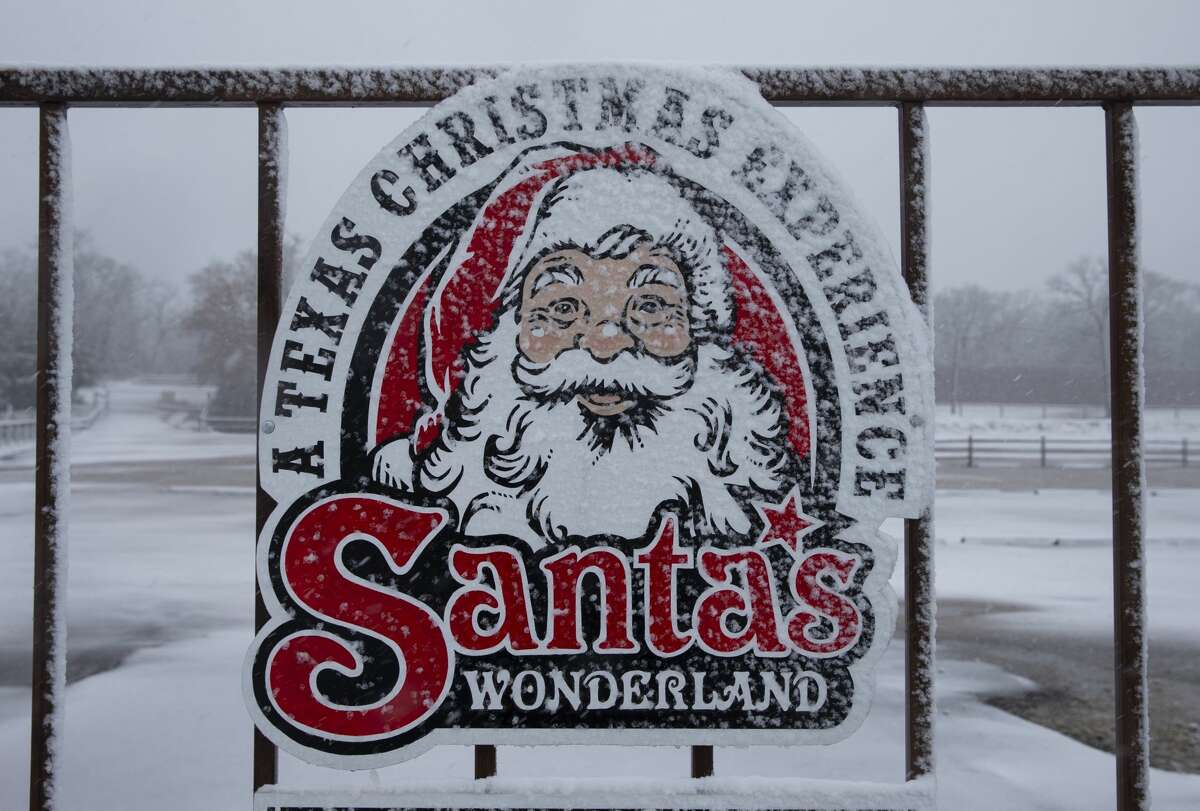 File: Snow comes down along Highway 6 at Santa's Wonderland Sunday, Jan. 10, 2021, in College Station.