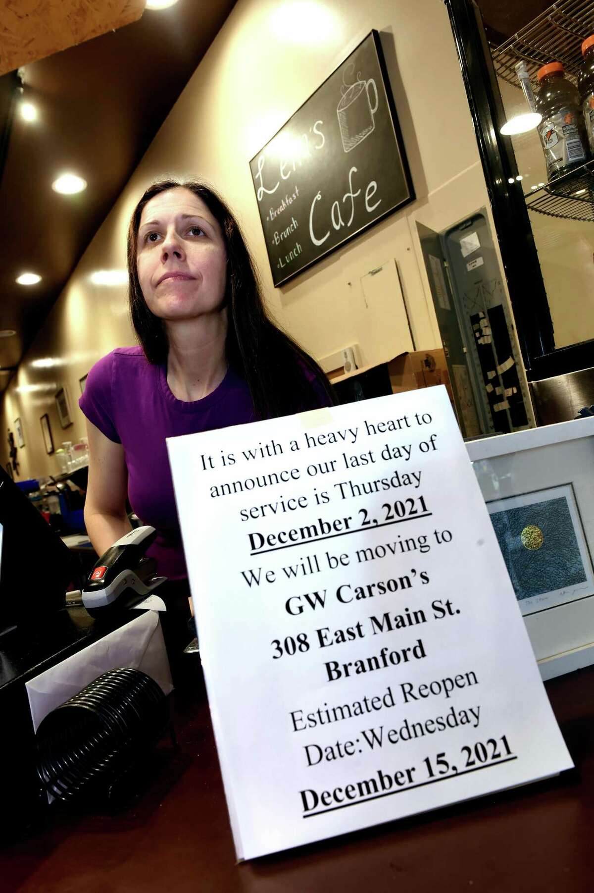 Christine Casinghino, owner of Lena’s Cafe and Confections, is photographed behind the counter at the restaurant on Whalley Avenue in New Haven Nov. 22, 2021. Casinghino will close the restaurant Dec. 2 and bring the Lena’s breakfast and brunch menu to GW Carson’s in Branford around Dec. 15.
