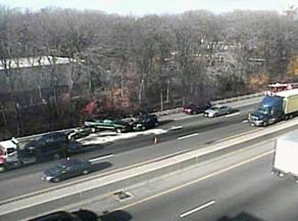 The state Department of Transportation reported the collision involving a tractor-trailer and two vehicles on the highway’s southbound lanes between exits 13 and 11 in Darien, Conn., on Monday, Nov. 29, 2021.