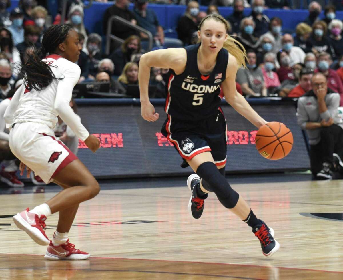 UConn guard Paige Bueckers (5) plays in UConn's season-opening 95-80 win over Arkansas in the NCAA women's basketball game at the XL Center in Hartford, Conn. Sunday, Nov. 14, 2021.