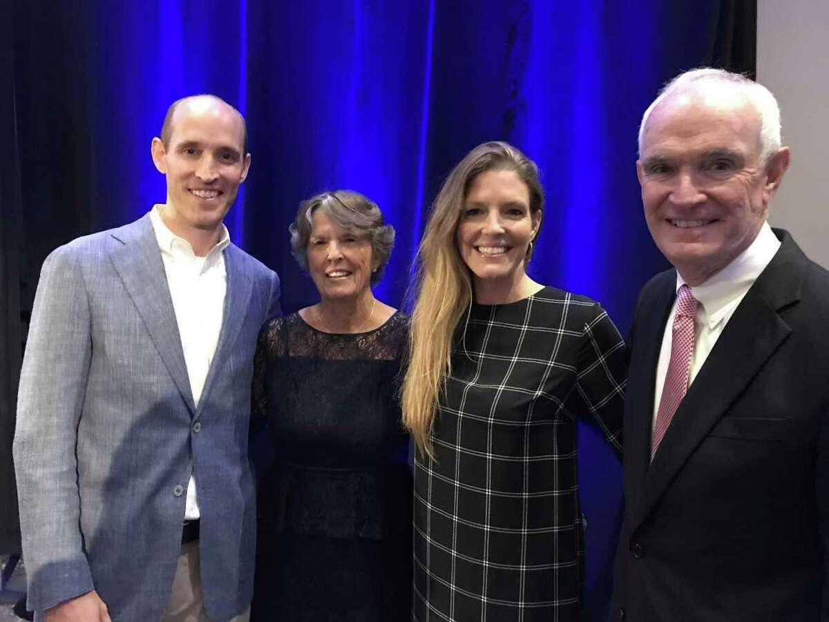Greenwich resident Dr. Philip J. McWhorter, right, recipient of the Lifetime Achievement Award at the 2019 Doctors of Distinction ceremony, with his wife, Linda, second from left, and their children Megan McCallen, second from right, and Dr. Peter McWhorter, left.