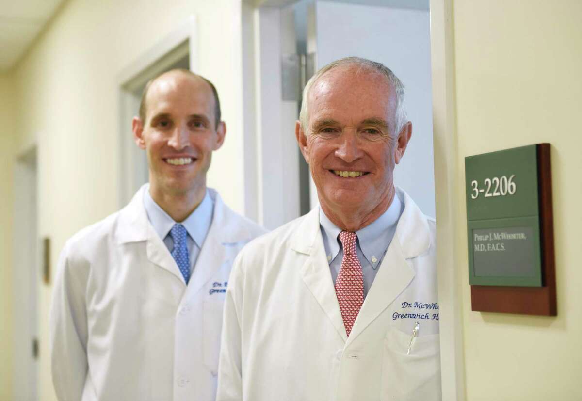 Northeast Medical Group Surgical specialists Dr. Peter McWhorter, left, and his father Dr. Philip McWhorter, at their private practice at Greenwich Hospital Greenwich, Conn. Monday, June 13, 2016. Although Philip did not push Peter to become a doctor, Peter saw his father as a role model and now the two work right next to each other at Greenwich Hospital.