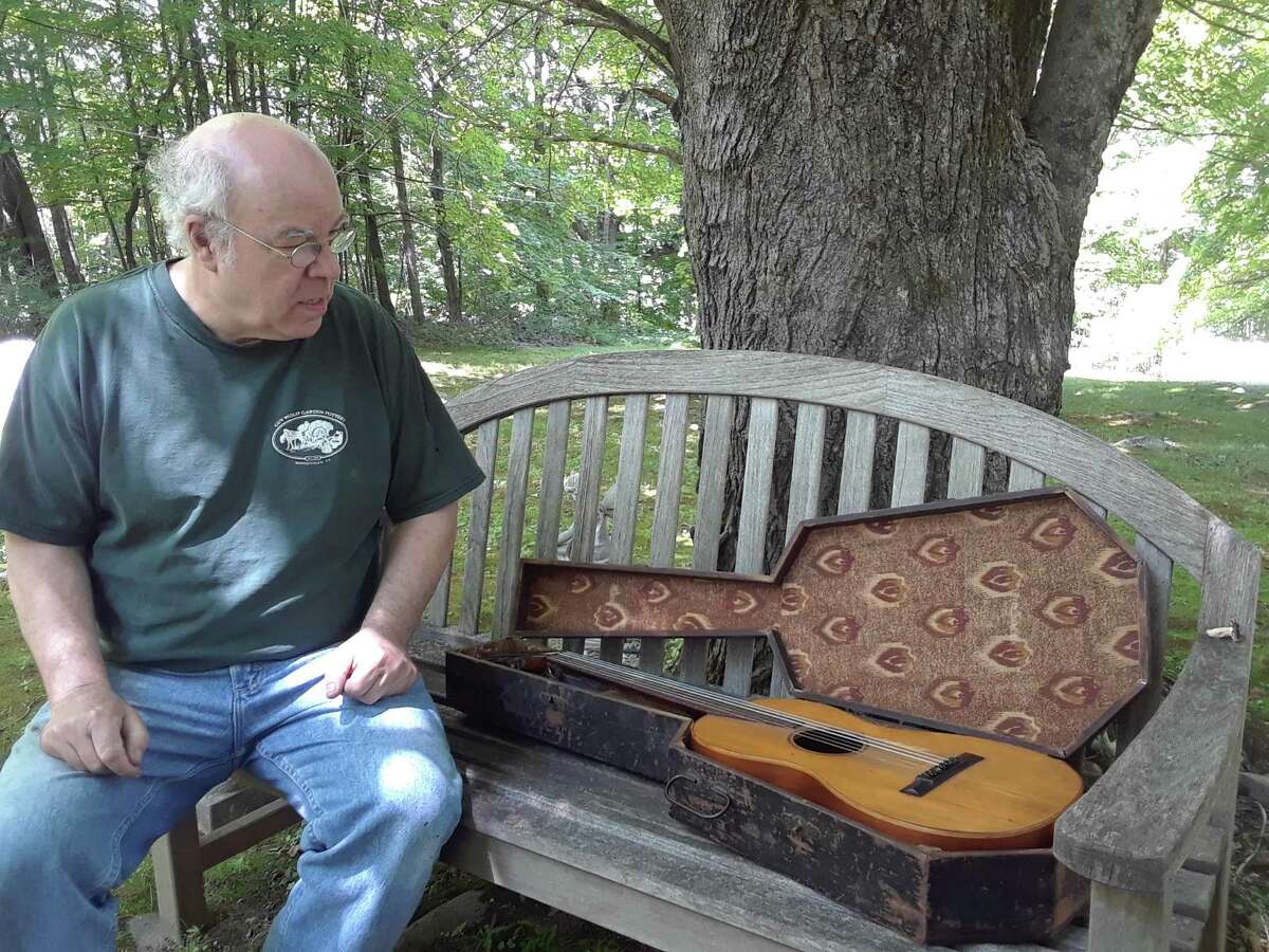 Musician and potter Guy Wolff of Bantam, pictured here in July 2020, owns a James Ashford guitar and a recreated Ashford banjo, which he says is "the best banjo I've ever had." Wolff, also a recording artist who plays a variety of stringed instruments, is a great admirer of the work of James Ashford, who owned and operated a guitar factory in Torrington from 1852 to 1864. Wolff is joining a virtual program Dec. 1 with the Torrington Historical Society to talk about the instruments.