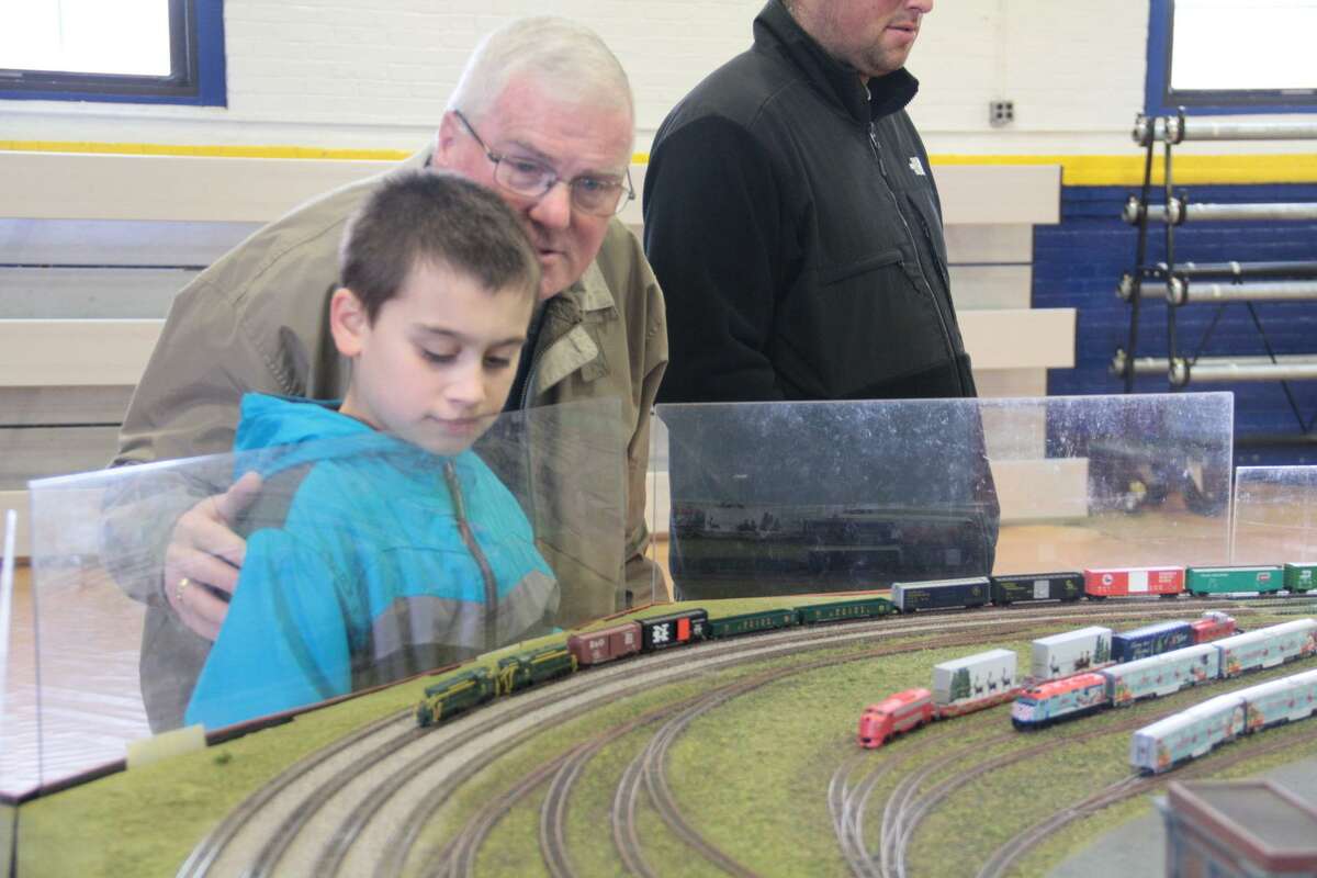 The Torrington Area Railroaders are holding the annual train show at the Torrington Armory Dec. 2-4. Admission is free, but all visitors are asked to bring a nonperishable food item for the local food bank. Pictured are visitors at a previous year’s show.