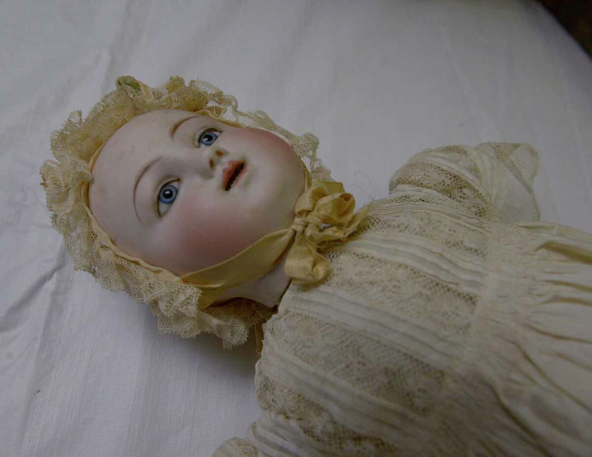 A china baby doll (ca. 1930s), which will be part of Keeler Tavern Museum’s upcoming exhibit “A Family Christmas at the Cannon Ball House.” Monday, Nov. 29, 2021. Ridgefield, Conn.