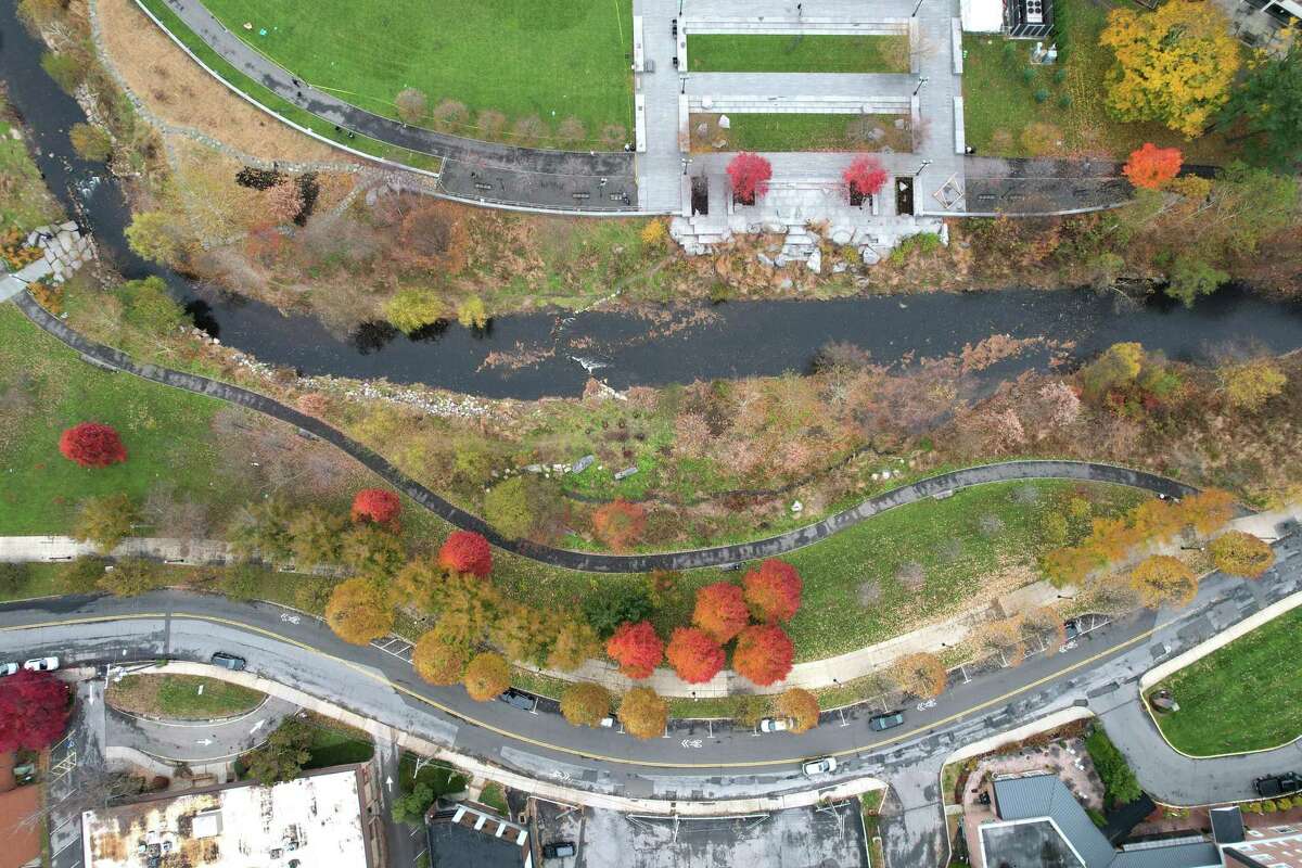 A stretch of the Mill River Greenway, a walking and biking trail along Mill River, photographed from above in Stamford on Nov. 22. The city just unveiled Phase II of the project, which will extend from the northwest corner of Mill River Park up Hanrahan Street on a winding path all the way up to Scalzi Park.