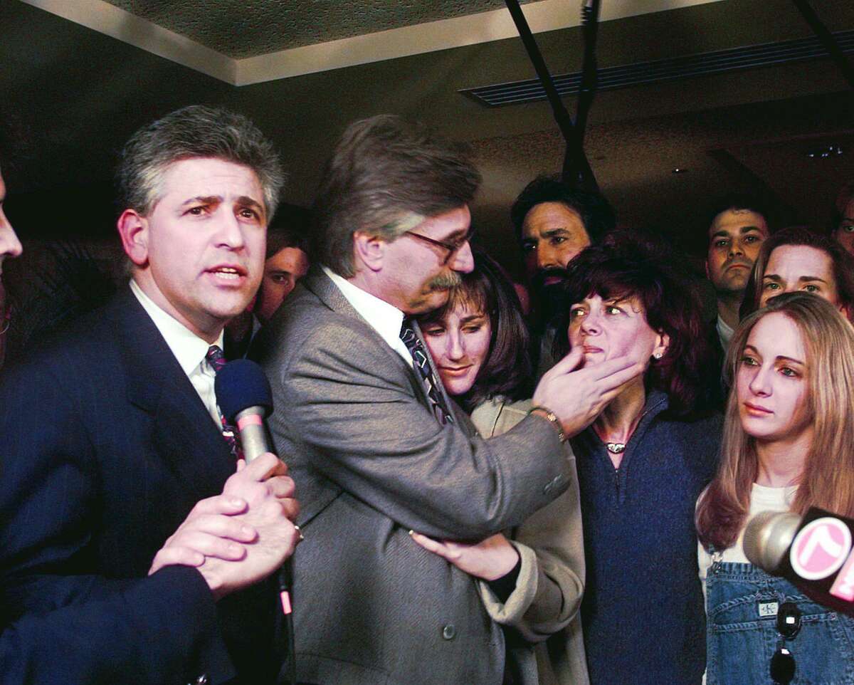RETRANSMISION FOR IMPROVED QUALITY --The Goldman family celebrates with attorney Daniel Petrocelli, left, after hearing that O.J. Simpson was found liable in the wrongful death civil case against him at Los Angeles County Superior Court in Santa Monica, Calif., Tuesday, Feb. 4, 1997. Seen are Petrocelli, Fred Goldman, Kim Goldman, and Patty Goldman. Women on far right is unidentified. (AP Photo/Nick Ut)