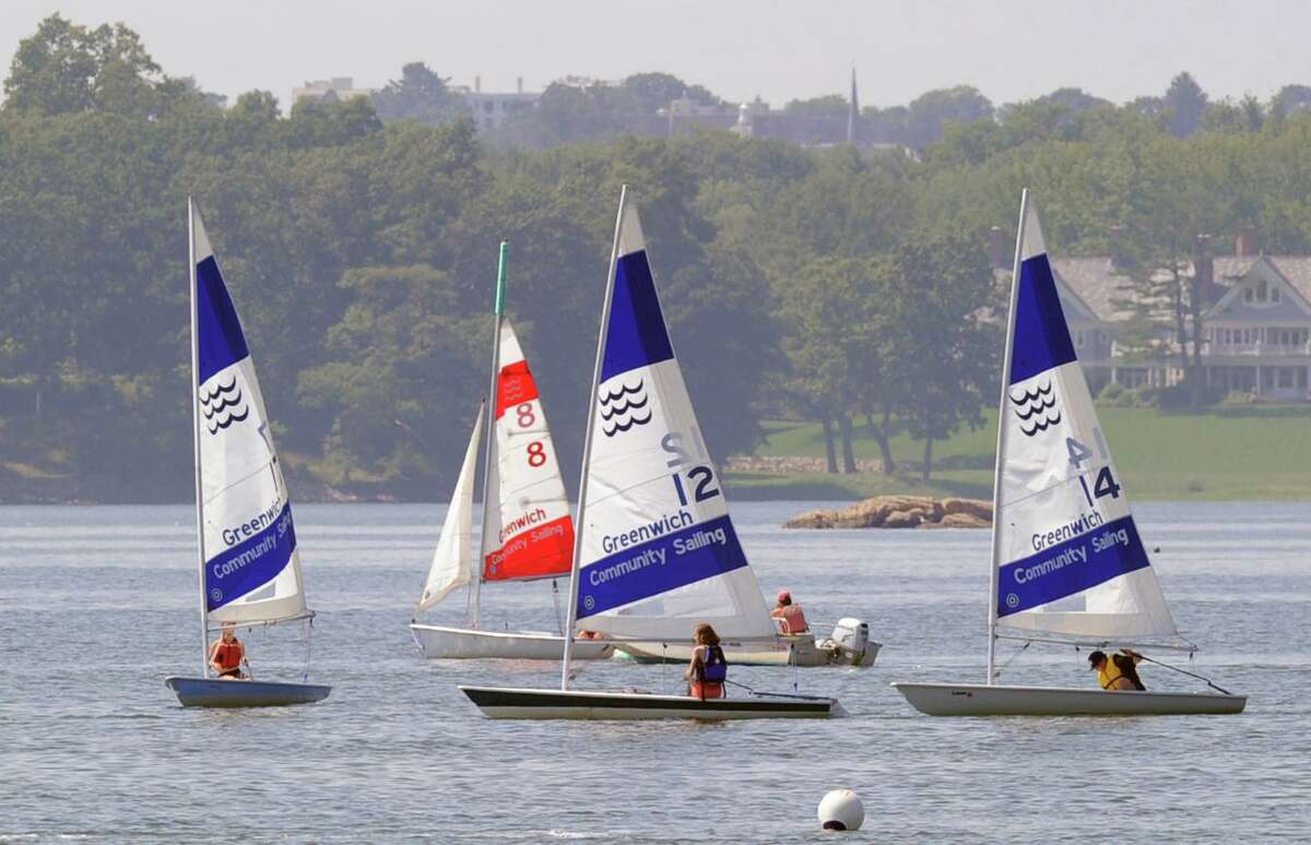 Greenwich Community Sailing School students sailors take part in a class in Greenwich Cove on July 21, 2015. The new sailing school is slated to open Memorial Day weekend at Greenwich Point.