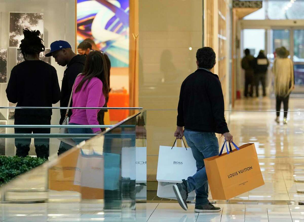 People shop in the Galleria Thursday, Nov. 4, 2021 in Houston.