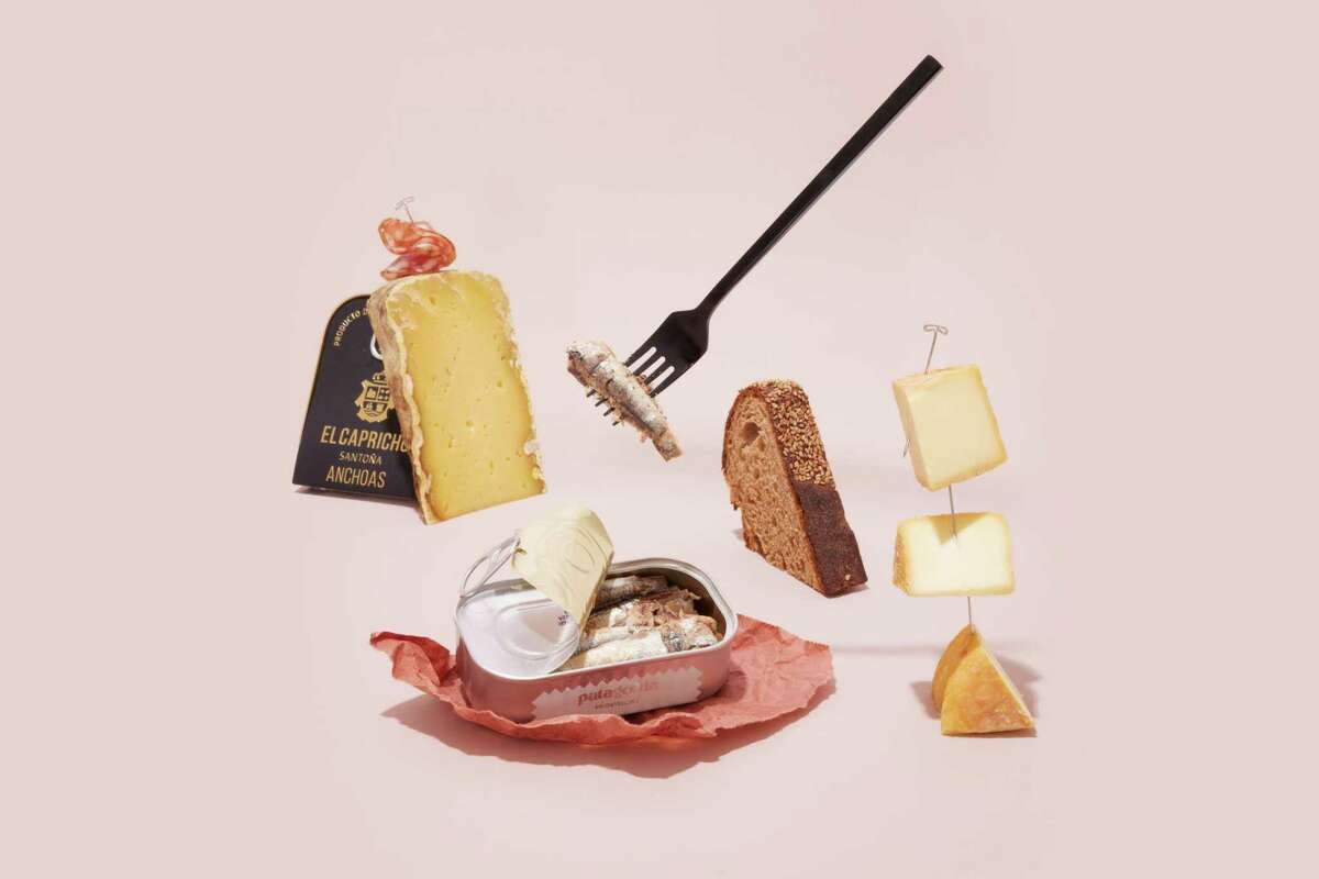 A spread of cheese and tinned fish from Alimentari Aurora, from our gift guide