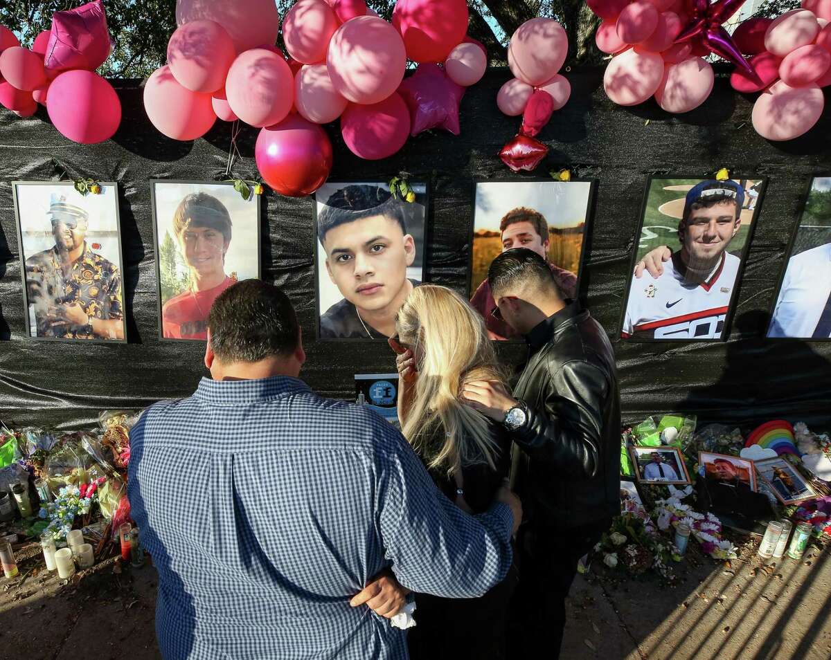 Maria de los Angeles Peña, wiped away tears while visiting the memorial for Astroworld Festival victims with her family outside NRG Park on Monday, Nov. 29, 2021, in Houston. Her son, 23-year-old Rodolfo “Rudy” Peña, was one of the victims from the crowd surge at the festival.