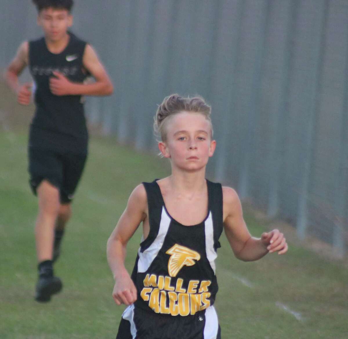 Miller Intermediate's Caden Shelton heads for a top three finish at Memorial High School on Nov. 10. Five days later, he earned a top-three finish again, posting a 12:29, just 21 seconds back of the district champion.