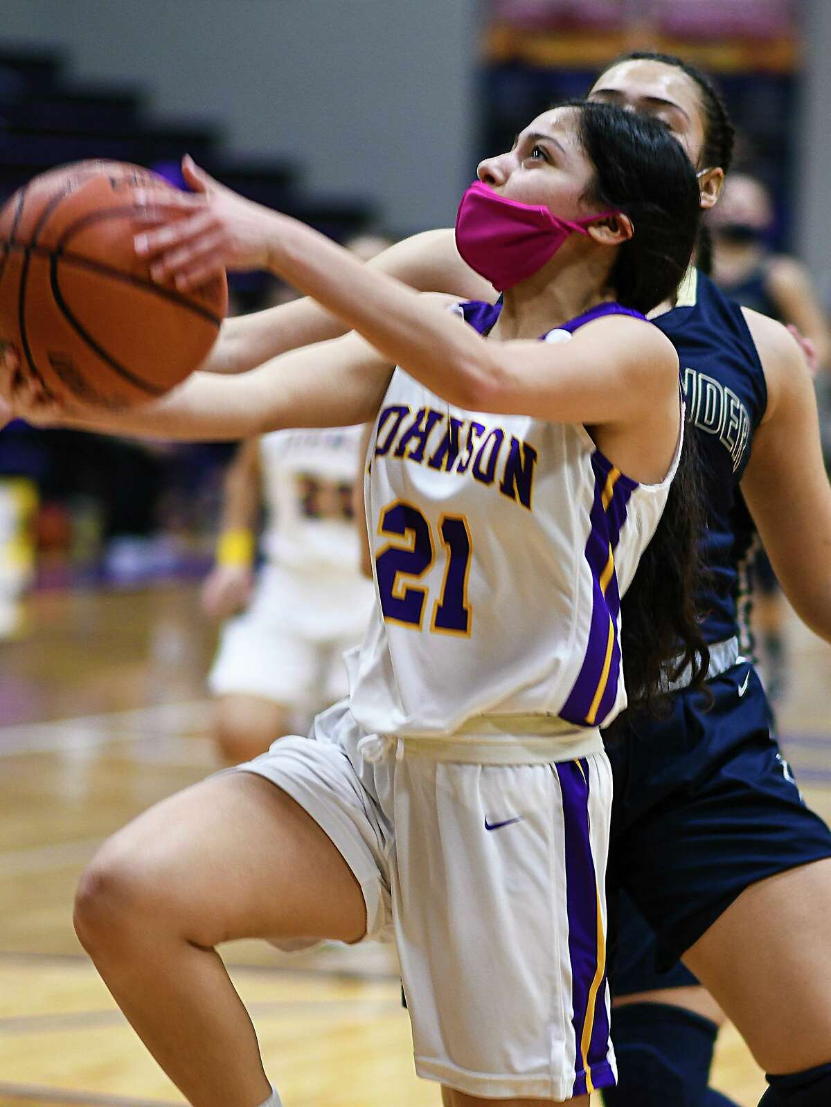 LBJ’s Leilana Medina goes for a layup during a game against Alexander High School.