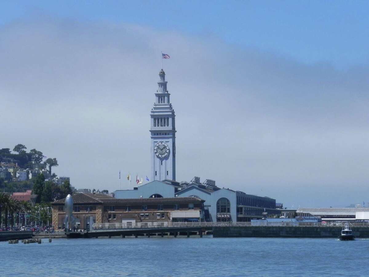 A photo of the San Francisco Ferry Building. Rescuers pulled a person from the waters near the Ferry Building. The extent of their injuries was not immediately known.