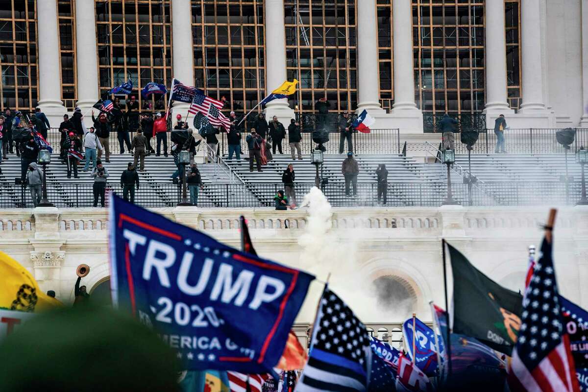 Supporters of President Donald Trump clash with police during a riot at the Capitol on Jan. 6, 2021, in Washington, DC. (Alex Edelman/AFP/Getty Images/TNS)