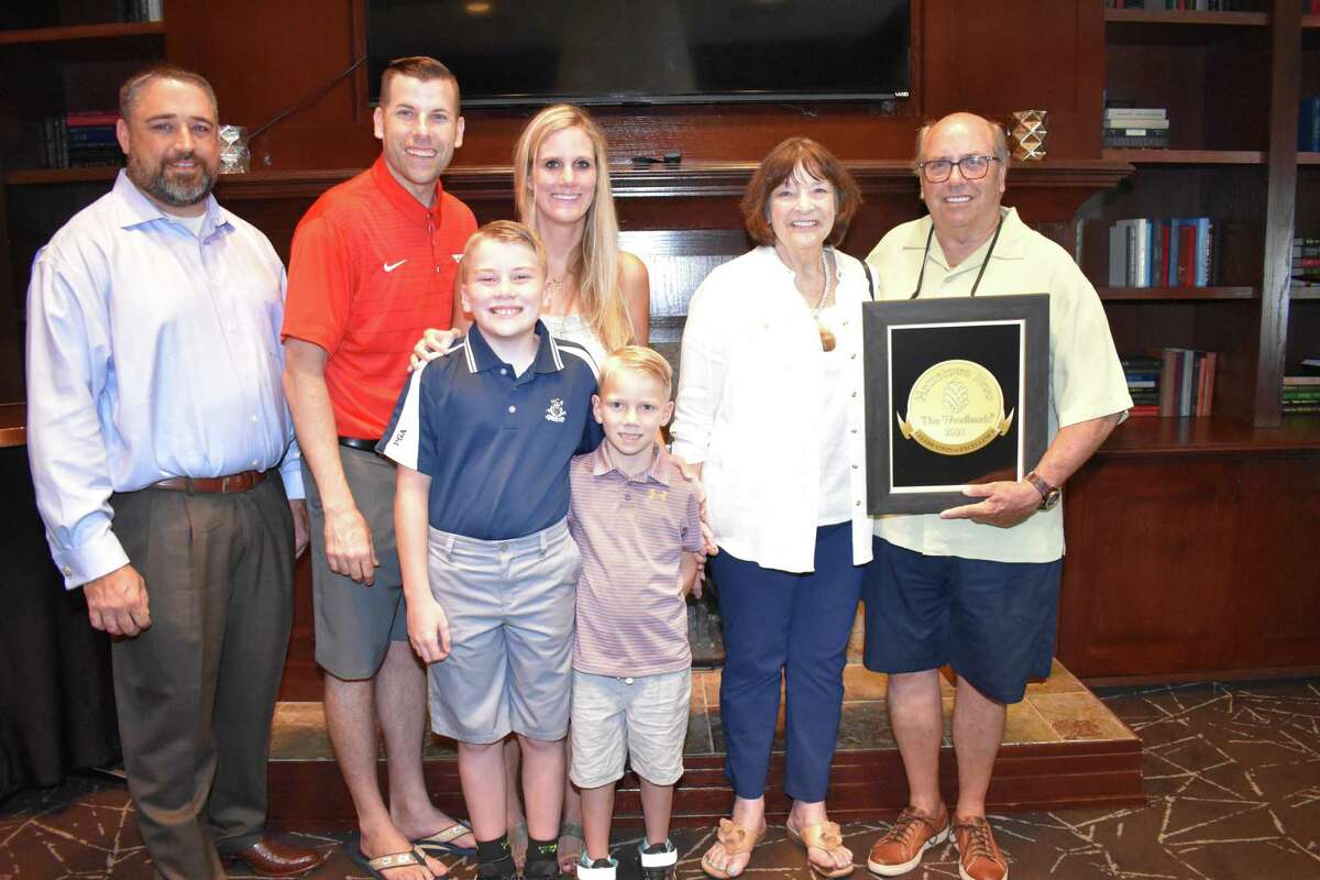 Walt Lisiewski, far right, 2022 Hometown Hero, with his wife Louise and family.