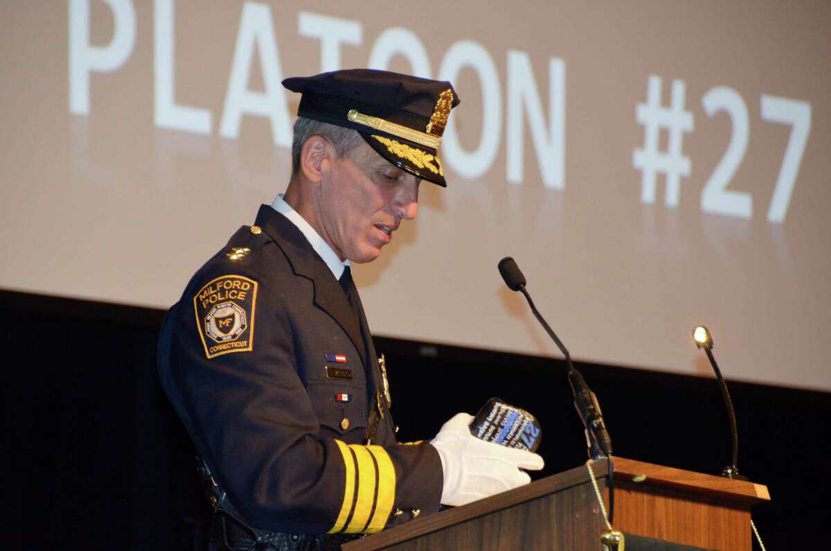 Milford Police Chief Keith Mello speaks to the graduates of the Milford Police Academy July 10, 2019 at the Parsons Government Center in Milford, Conn.