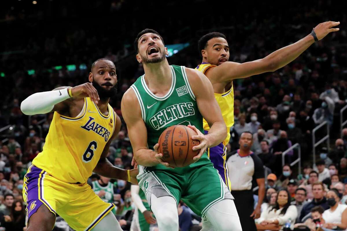 Boston Celtics player Enes Kanter, right, is making strong moves to bring attention to human rights abuses in China. The NBA, Nike and LeBron James, left, meanwhile, have flopped.