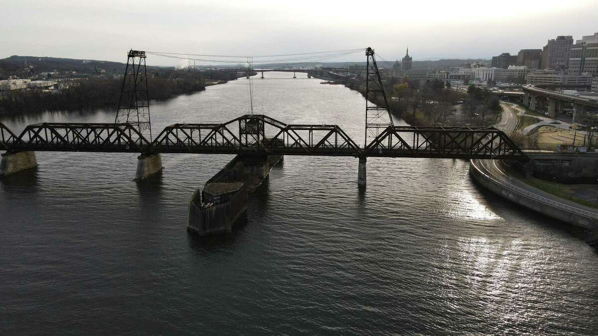 The Livingston Avenue rail bridge that spans the Hudson River between Albany and Rensselaer is seen on Tuesday afternoon, Nov. 30, 2021, in Albany, N.Y. U.S. Senate Majority Leader Chuck Schumer is urging Amtrak to prioritize repairing the historic 120-year-old bridge after receiving a $22 billion windfall from the $1 trillion infrastructure bill.