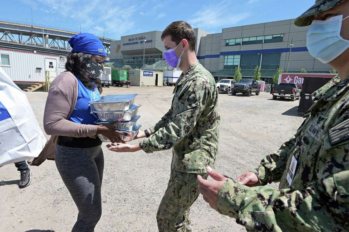 Nykeshia Jordan from Melba’s Poboys donates food to the Expeditionary Medical Facility New Orleans Detachment, which treated patients in April 2020, near the start of the coronavirus pandemic as part of U.S. Army North’s efforts on behalf of local hospitals.