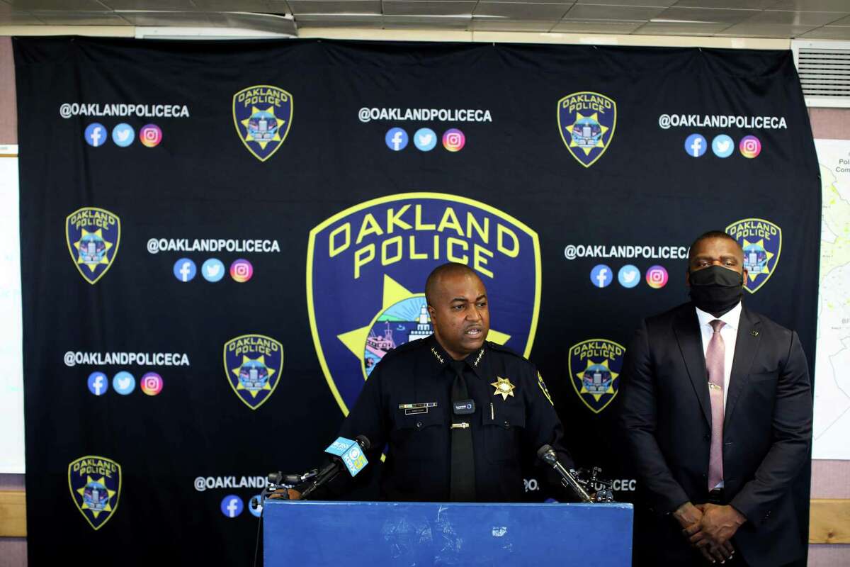 Chief LeRonne Armstrong (left) and Lt. Frederick Shavies, homicide section commander, speak at a news conference at Oakland Police headquarters in Oakland, Calif. Armstrong made remarks regarding recent events of violent crime in Oakland.