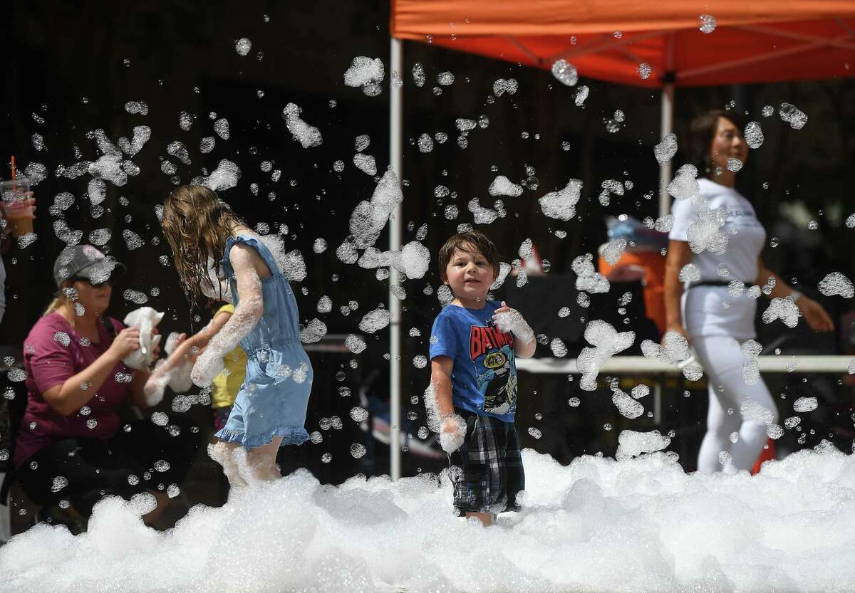 A blowing soap bubble station was a hit with kids at Beaulympics Saturday. Games, entertainment, contests and various community vendors gathered for the day-long event. Photo made Saturday, July 17, 2021 Kim Brent/The Enterprise