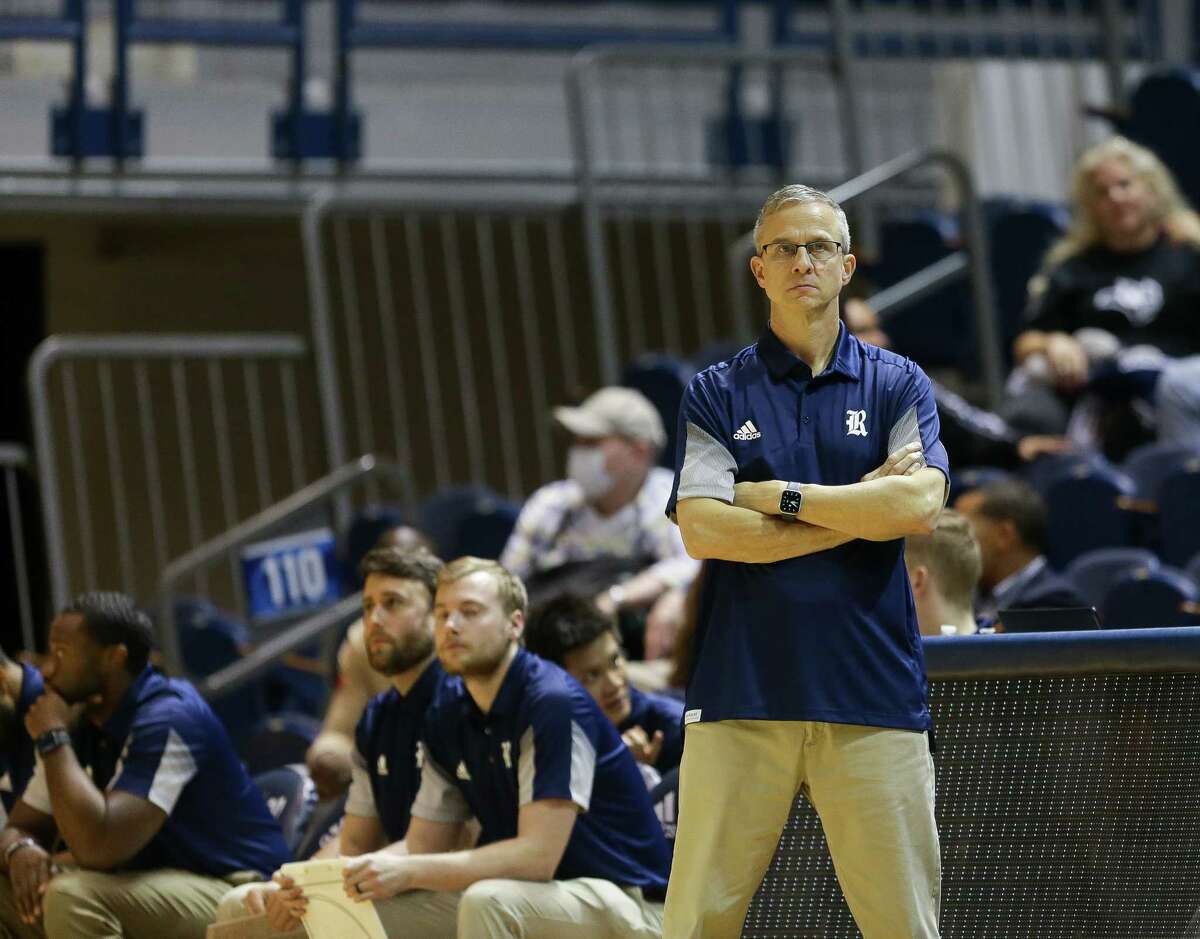 Rice Owls head coach Scott Pera watches from the sideline during the second half of an NCAA game against the Texas State Bobcats at Tudor Fieldhouse on Tuesday, Nov. 30, 2021, in Houston.