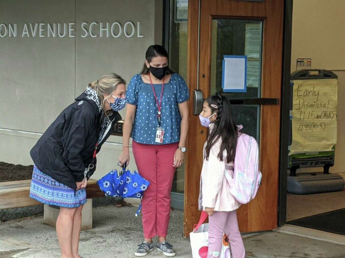 Special education teachers Dina Rush and Emilia Furano helped guide students toward their classrooms on the first day of school at Hamilton Avenue School on Wednesday morning, Sept. 1, 2021, in Greenwich.