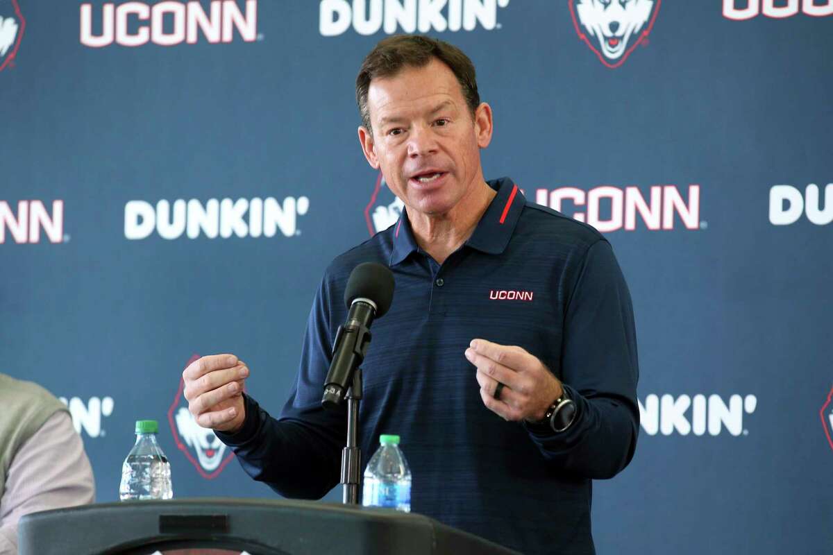 Jim Mora speaks with the media during a press conference announcing him as the new head coach at UConn on Saturday.