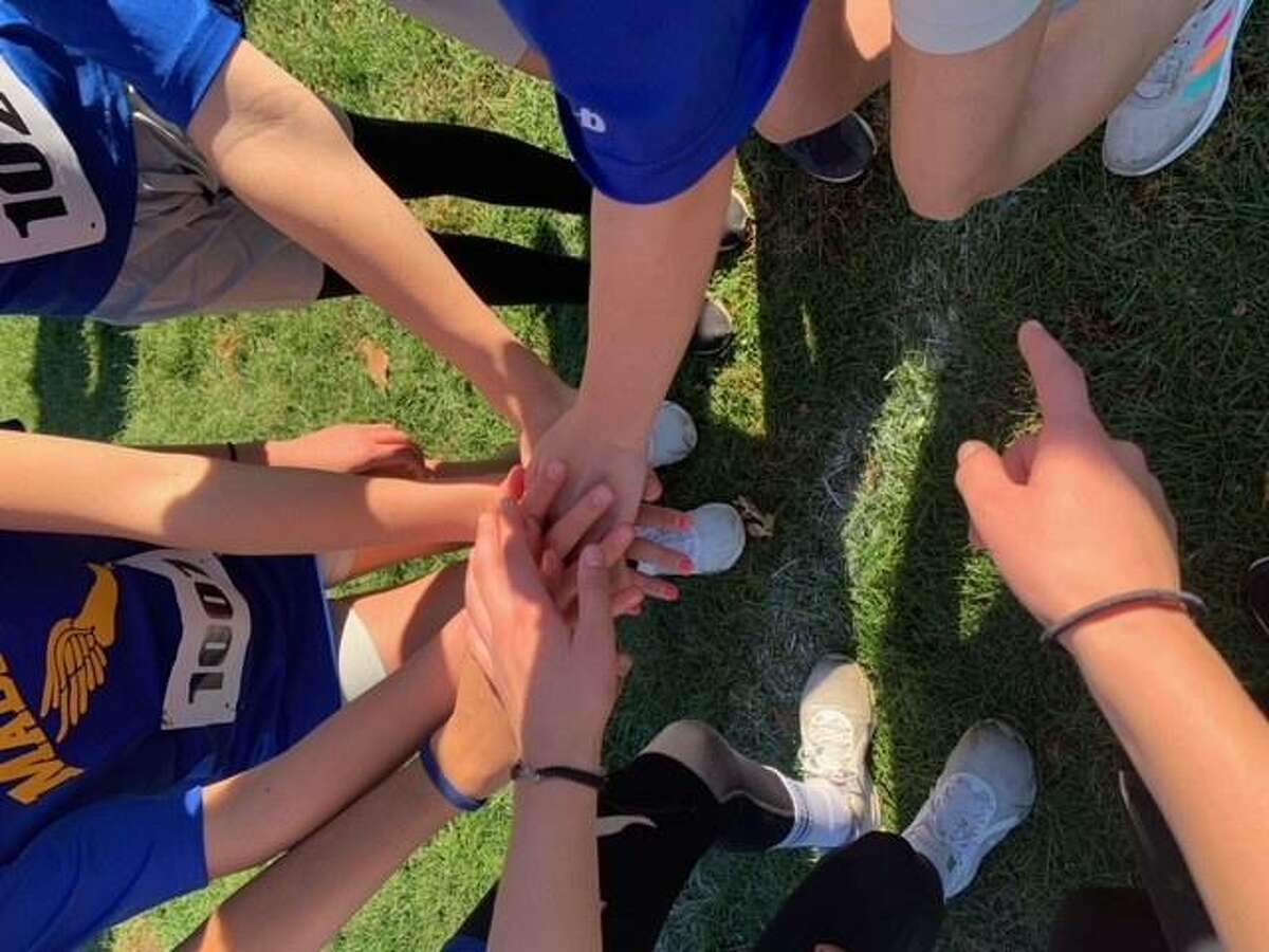 Hillcrest and Madison cross country runners competed at the Connecticut Middle School State Championships.