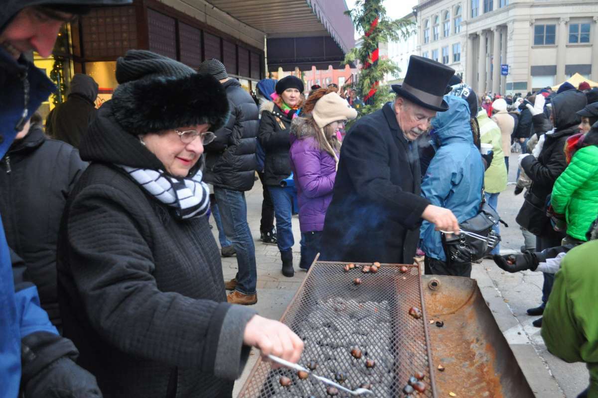 Bob and Jan Kenny serve up some chestnuts during theVictorian Sleighbell Parade. The 2021 event is set to take place on Dec. 4.