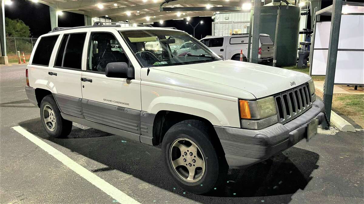 This vehicle was used to smuggle a migrant who was hiding in a plastic container covered by Christmas decorations.