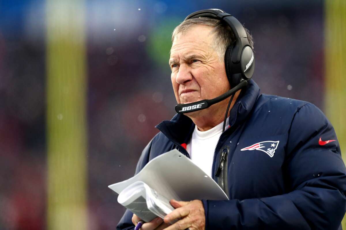 FOXBOROUGH, MASSACHUSETTS - NOVEMBER 28: Head coach Bill Belichick of the New England Patriots looks on from the side line during the second half of the game against the Tennessee Titans at Gillette Stadium on November 28, 2021 in Foxborough, Massachusetts. (Photo by Adam Glanzman/Getty Images)