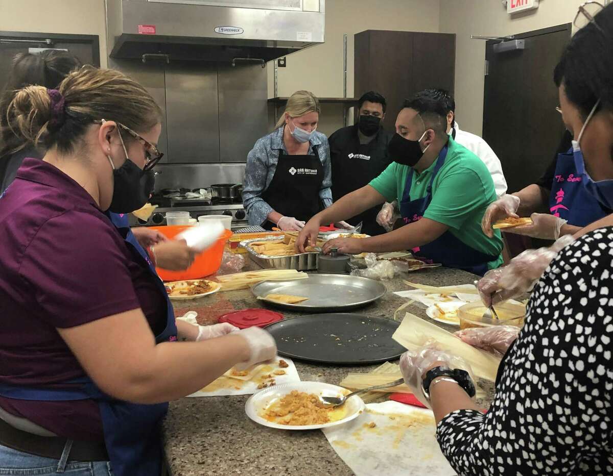 Jesse "Chef Kirk" Kuykendall demonstrates how to make tamales at the San Antonio Lighthouse for the Blind and Visually Impaired on Wednesday morning.