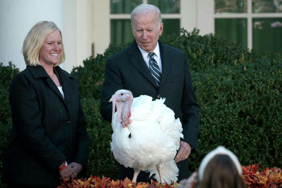President Joe Biden pardons Peanut Butter the turkey during the 74th annual Thanksgiving turkey pardoning in the Rose Garden of the White House on Friday, Nov. 19, 2021, in Washington, D.C.