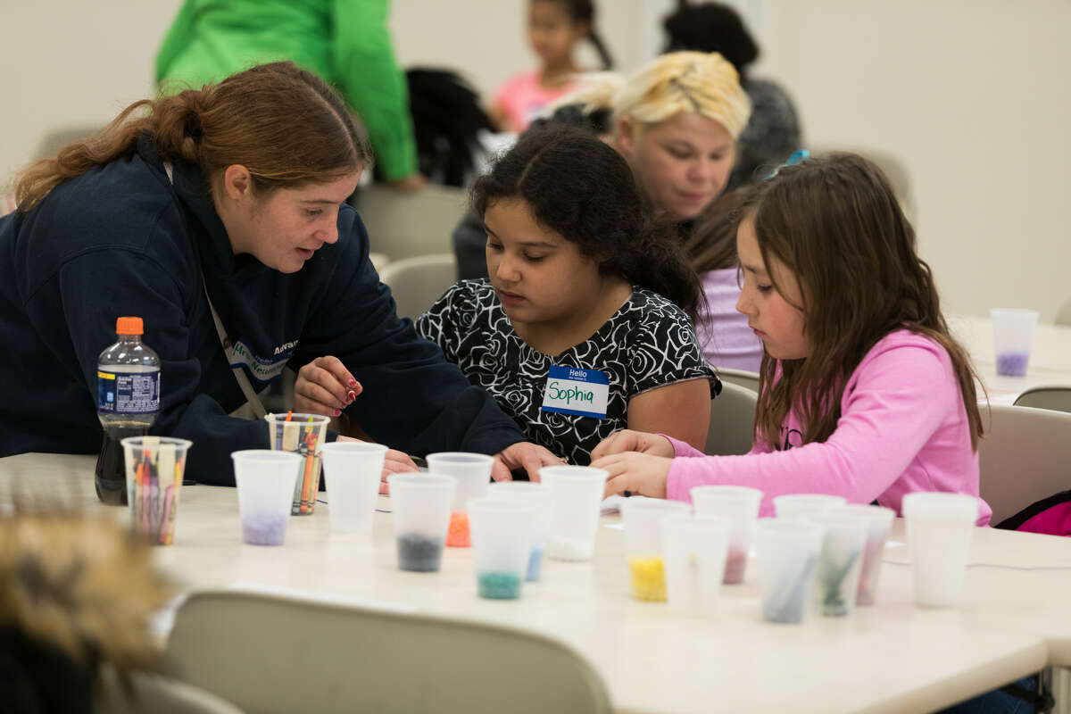 Students work on a STEAM (science, technology, engineering, arts, mathematics) activity at the Marshall M. Fredericks Sculpture Museum during the Hour of Code event hosted at SVSU in 2017.