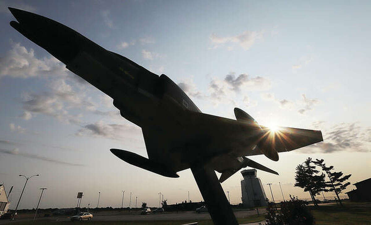 The sun rises above the F4 Phantom fighter jet Friday morning at St. Louis Regional Airport. State officials on Wednesday announced $1.75M in funding for two projects at the airport.