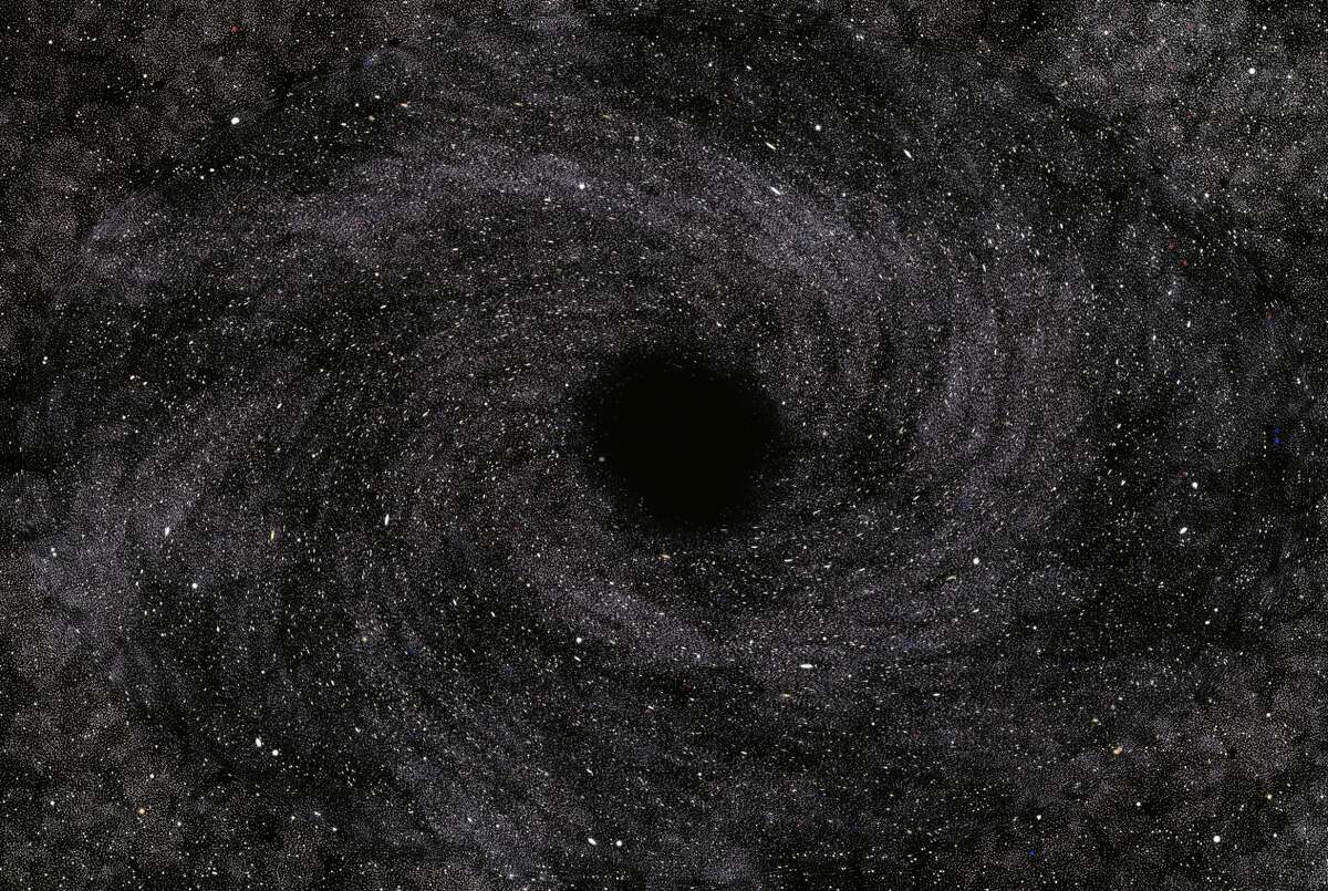 A file photo of a black hole in space.