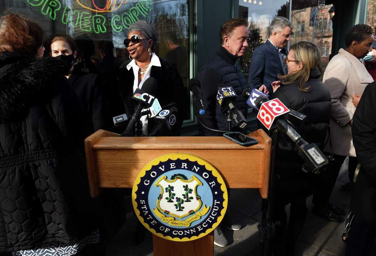 From left, Claire Criscuolo, owner of Claire’s Corner Copia, Lt. Gov. Susan Bysiewicz, state Rep. Robyn Porter, Gov. Ned Lamont, Connecticut COO Josh Geballe, state Sen. Julie Kushner and Andrea Barton Reeves, CEO of the Paid Family and Medical Leave Insurance Authority, leave a press conference Wednesday after announcing that the family and medical leave program had begun taking applications.