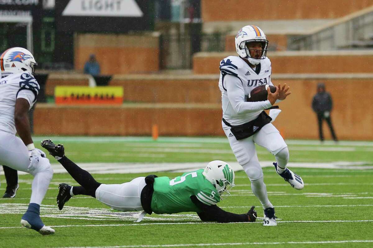 UTSA quarterback Frank Harris runs the ball during the first half of an NCAA college football game against North Texas in Denton, Texas, Saturday, Nov. 27, 2021.