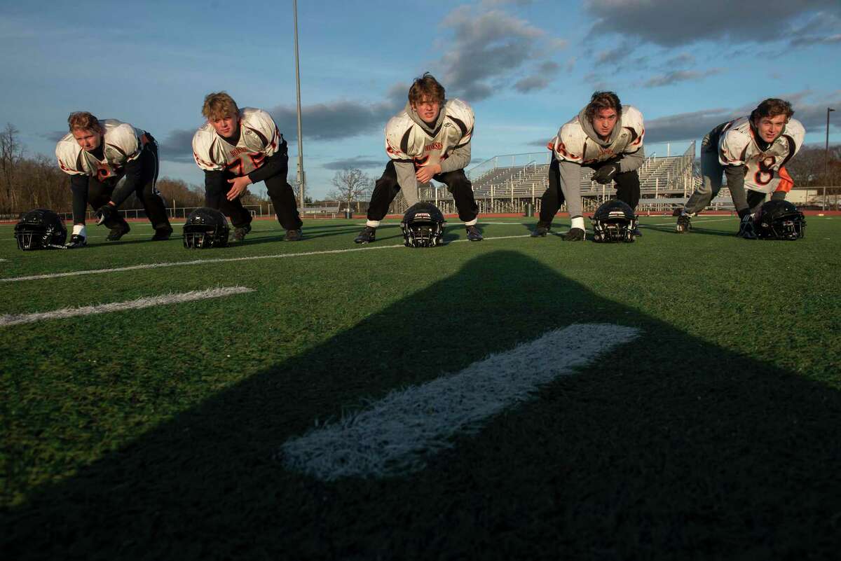 Schuylerville's offensive line, from left, tackle Austin Prouty, guard Josh Bowen, center Carson Patrick, guard Ryan Peck and tackle Anthony Luzadis at practice on Wednesday, Dec. 1, 2021 in Schuylerville, N.Y.