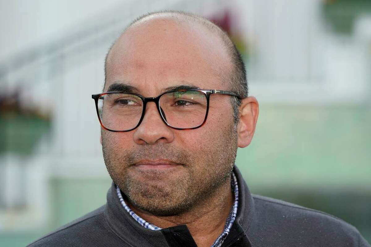 San Francisco Giants president of baseball operations Farhan Zaidi talks with reporters during Major League Baseball's general manager meetings, Wednesday, Nov. 10, 2021, in Carlsbad, Calif. (AP Photo/Gregory Bull)