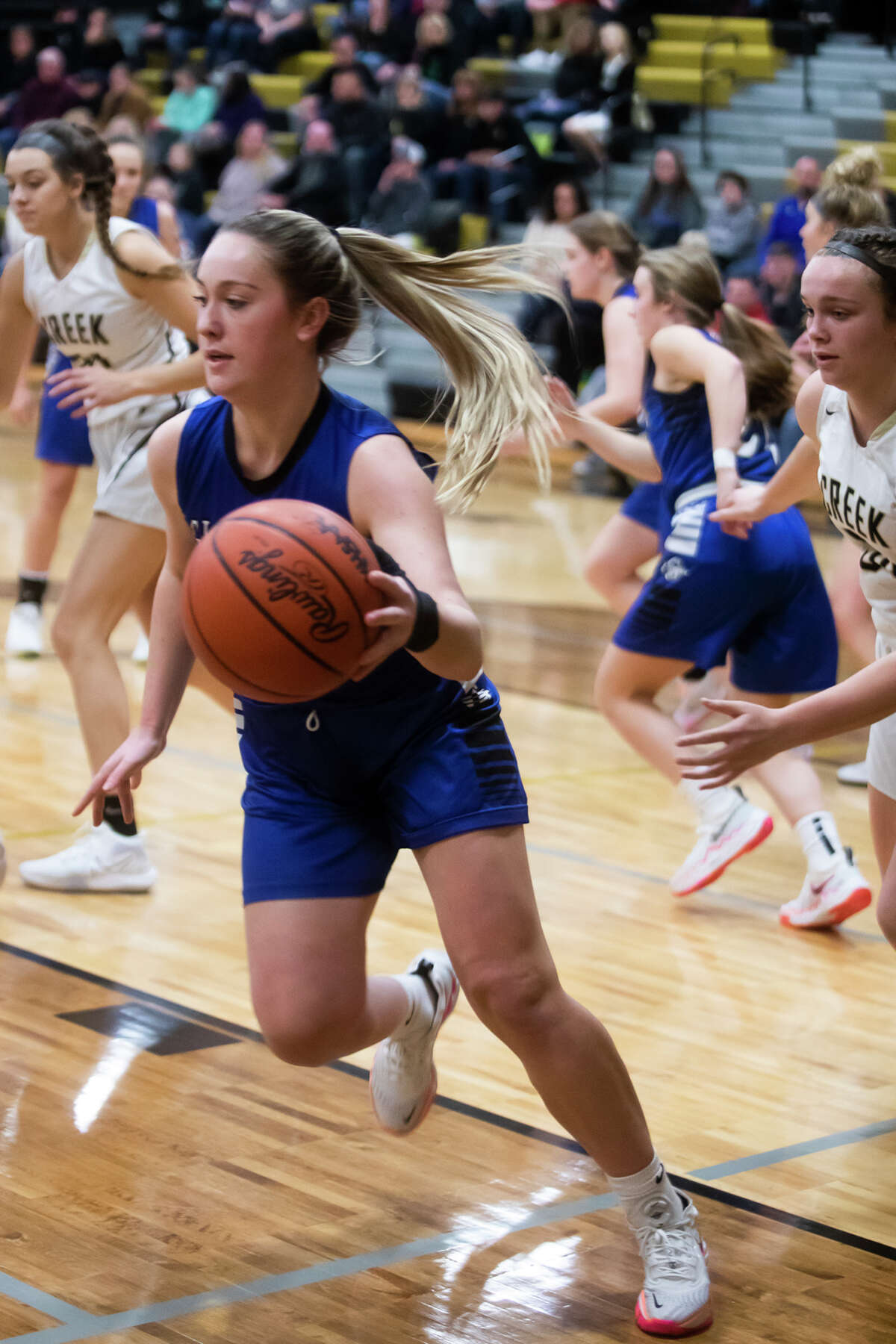 Gladwin's Lizzie Haines dribbles down the court during a game against Bullock Creek Wednesday, Dec. 1, 2021 at Bullock Creek High School.