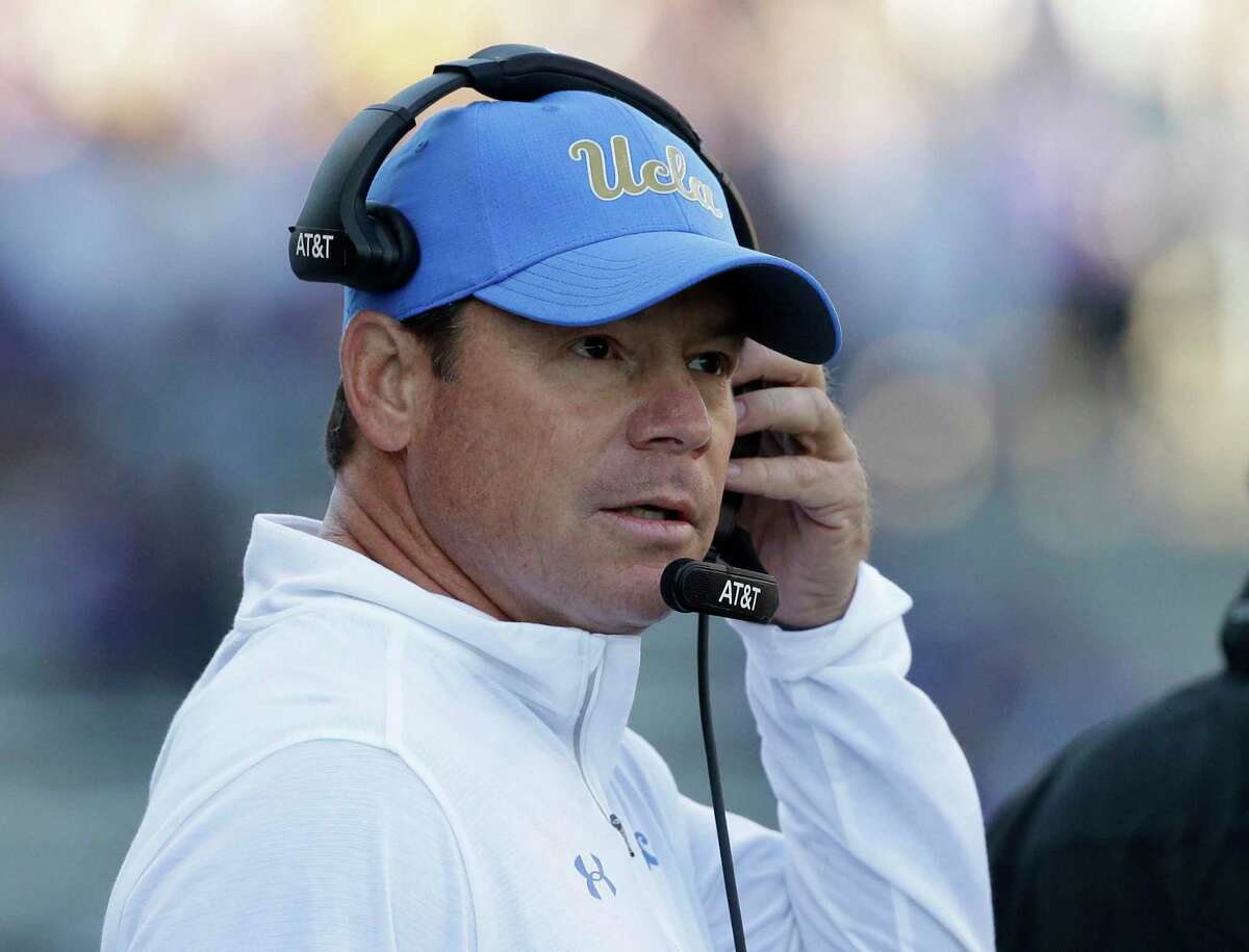 UCLA head coach Jim Mora looks toward the field in the first half of an NCAA college football game against Washington on Saturday, Oct. 28, 2017, in Seattle.